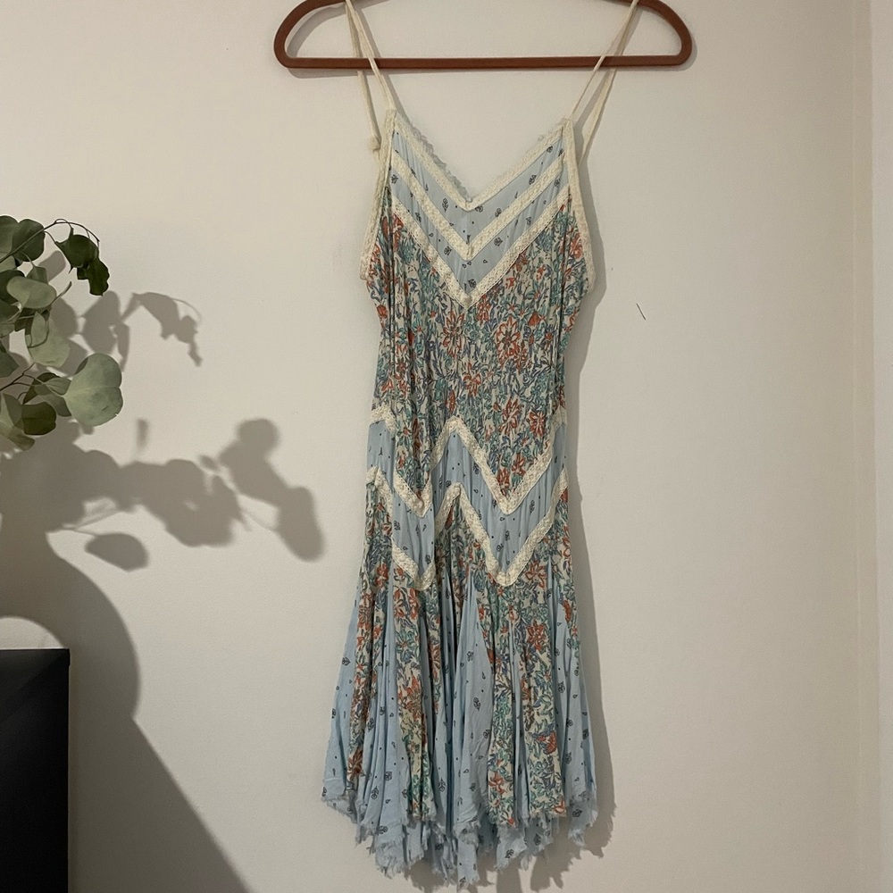 Free people slip with handkerchief hem